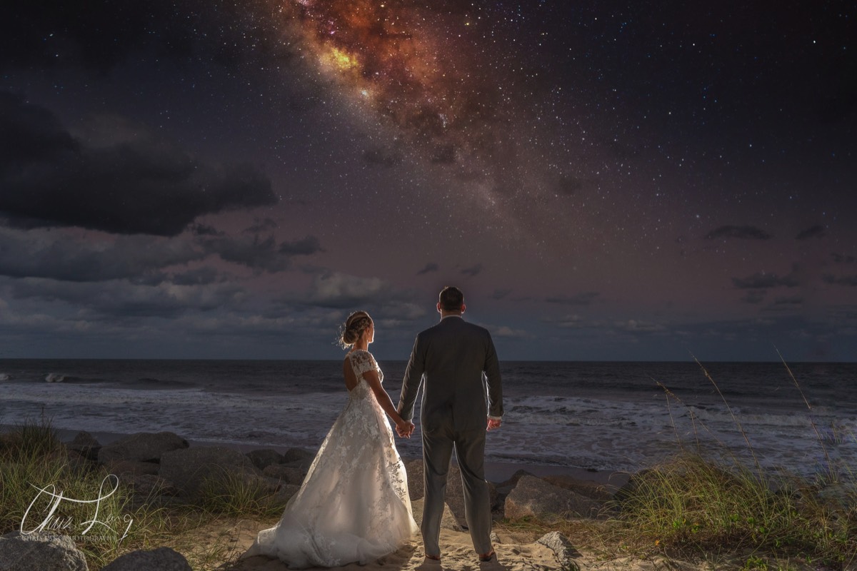 Bride & groom on the beach at sinset - twilight - wilmington nc wedding photographers - creative wedding photo - signature portrats - wedding ideas - bride - groom - wedding dress - chris lang photography