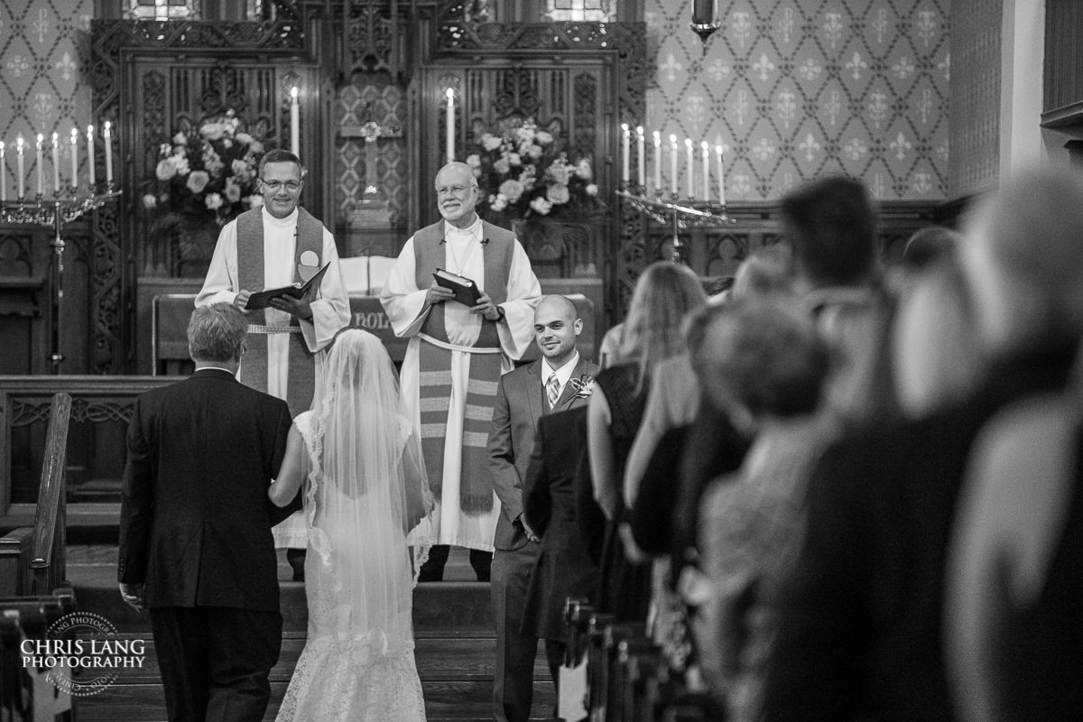 bride walking down the Isle - Wilmington NC Wedding Photography - Wedding ceremony photo - Wedding ceremonies - bride - groom - bridal party - wedding ceremony photography - ideas